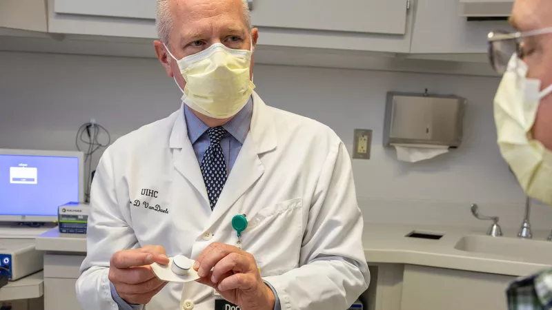 Douglas Van Daele with simulated patient in the Otolaryngology clinic on Thursday, Sept. 22, 2022.